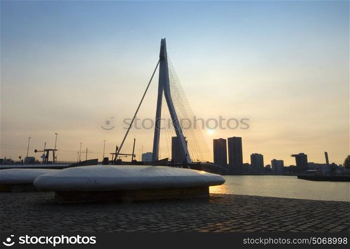 The Erasmus Bridge and part of Rotterdam Harmour at sunset