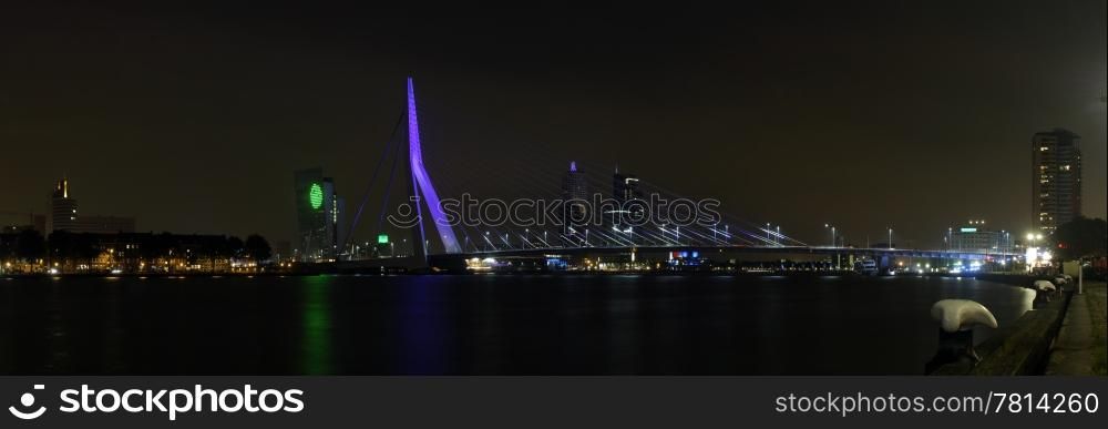 The Erasmus Bridge and the Rotterdam skyline at night; a panoramic image, stitched together fom 22 images.