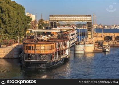The Esna Lock is a device for raising or lowering boats between stretches of water of different levels on Nile River at Esna, Egypt