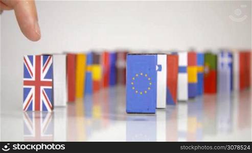 The Eu Dominos Fall. Flags of European Countries like a domino falling down