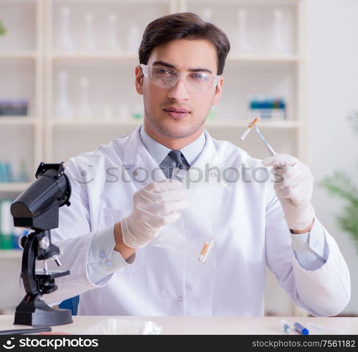 The expert criminologist working in the lab for evidence. Expert criminologist working in the lab for evidence