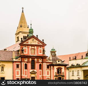 the exterior facade of Saint George Basilica: red and yellow colours