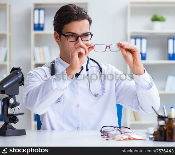 The eye doctor in medical concept. Eye doctor in medical concept