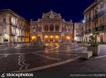 The facade of the theater Massimo Bellini in the night lighting. Catania Sicily. Italy.. Catania. Theater Massimo Bellini.