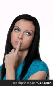 the face of a pensive young woman against a white background