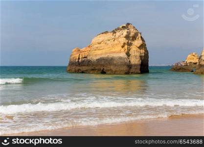 the famous beach of Praia da Rocha in Portimao. This beach is a part of famous tourist region of Algarve.. Praia da Rocha