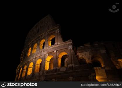 The famous Colosseum at night in Rome, Italy