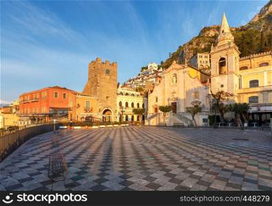 The famous main square of Piazza April IX in Taormina at sunrise. Italy. Sicily.. Taormina. Sicily. Piazza IX April.