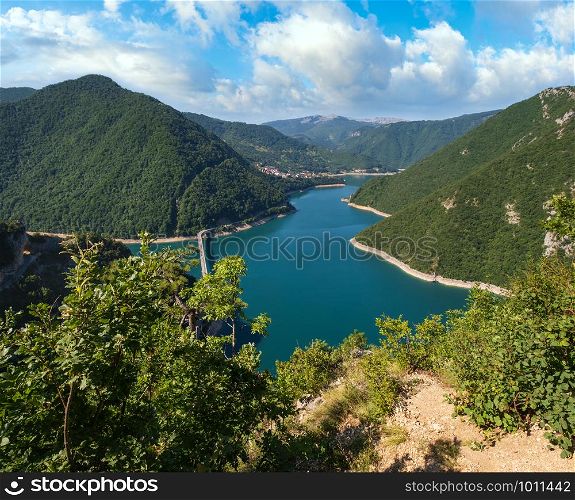 The famous Piva river canyon with its fantastic reservoir Piva Lake (Pivsko Jezero) summer view in Montenegro. Nature travel background.