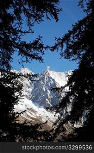 The famous sharp pinnacle of the Dent du GAant, Mont Blanc Massif, Courmayeur, Italy. Wiki: http://en.wikipedia.org/wiki/Dent_du_GAant