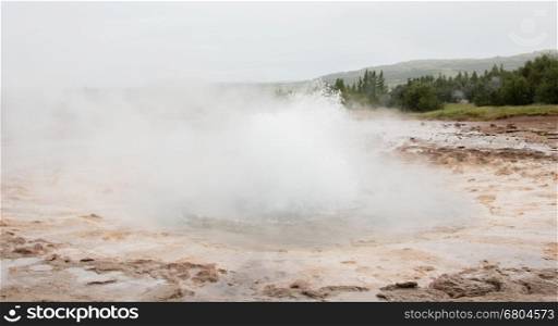 The famous Strokkur Geyser about to erupt - Iceland - Close-up