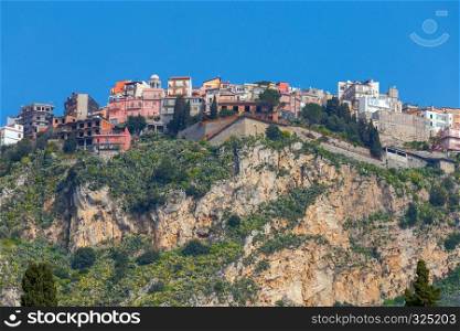 The famous village Castelmola on the top of the mountain. Italy. Sicily.. Italy. Village of Castelmola.
