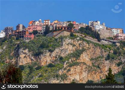 The famous village Castelmola on the top of the mountain. Italy. Sicily.. Italy. Village of Castelmola.