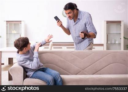The father beating and punishing his sone. Father beating and punishing his sone