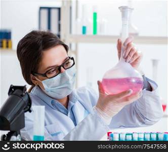 The female chemist working in hospital lab. Female chemist working in hospital lab