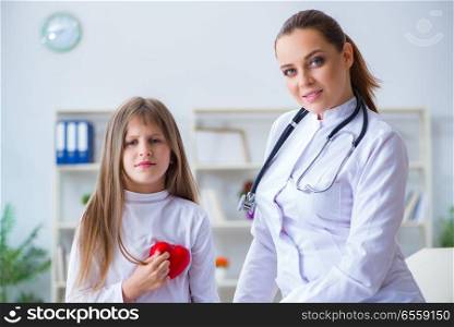 The female doctor pediatrician checking girl. Female doctor pediatrician checking girl