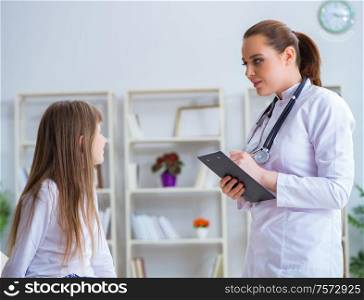 The female doctor pediatrician checking girl. Female doctor pediatrician checking girl