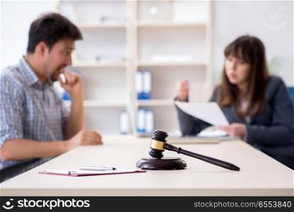 The female lawyer meeting with his male client in the office. Female lawyer meeting with his male client in the office