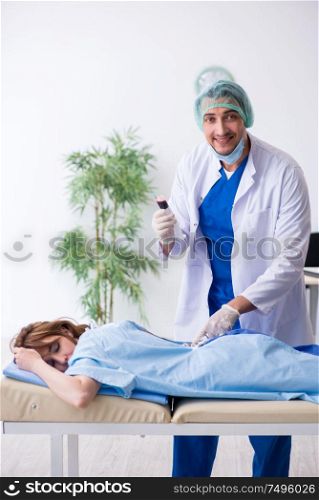 The female patient getting an injection in the clinic. Female patient getting an injection in the clinic