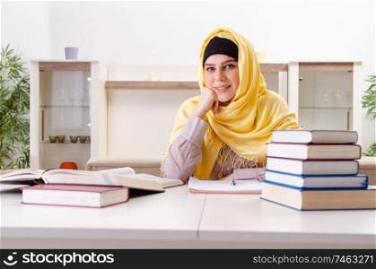 The female student in hijab preparing for exams . Female student in hijab preparing for exams 