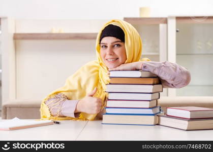 The female student in hijab preparing for exams . Female student in hijab preparing for exams 