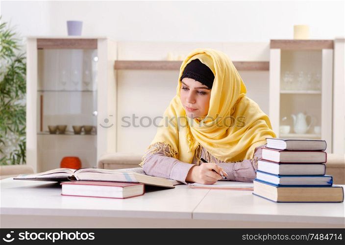 The female student in hijab preparing for exams . Female student in hijab preparing for exams