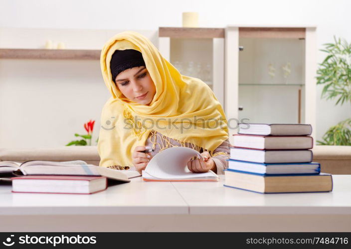 The female student in hijab preparing for exams. Female student in hijab preparing for exams