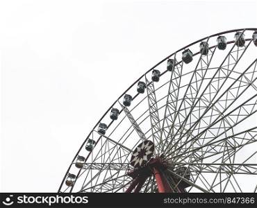 The ferris wheel and white sky on the background.Gorky Park, Kharkov city, Ukraine