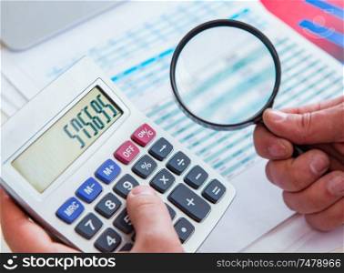 The finance analyst looking and financial reports. Finance analyst looking and financial reports