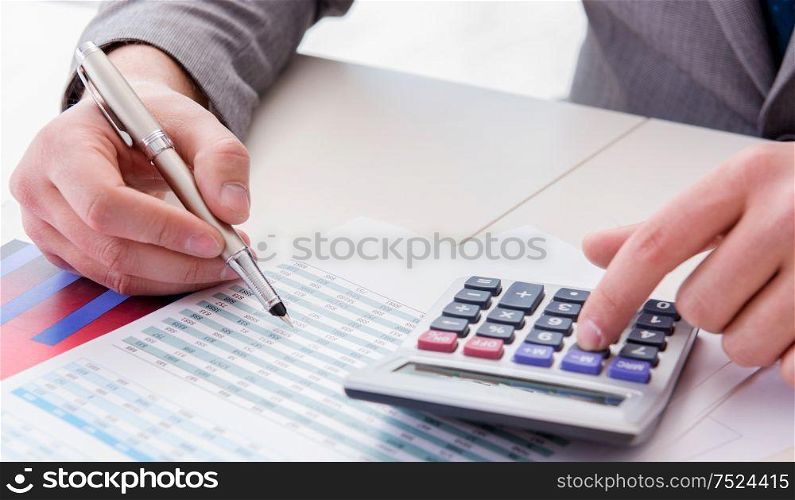 The finance analyst looking and financial reports. Finance analyst looking and financial reports