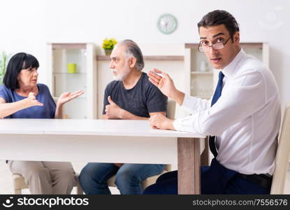 The financial advisor giving retirement advice to old couple. Financial advisor giving retirement advice to old couple