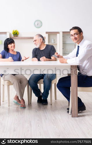 The financial advisor giving retirement advice to old couple. Financial advisor giving retirement advice to old couple