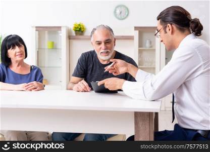 The financial advisor giving retirement advice to old couple. Financial advisor giving retirement advice to old couple