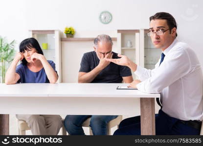 The financial advisor giving retirement advice to old couple. Financial advisor giving retirement advice to old couple