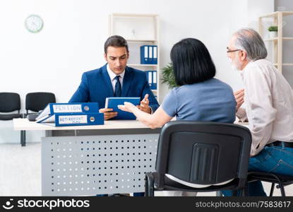 The financial advisor giving retirement advice to old couple. Financial advisor giving retirement advice to old couple