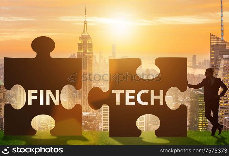 The fintech financial technology concept with puzzle pieces. Fintech financial technology concept with puzzle pieces