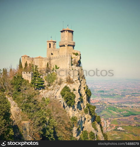 The first tower of San Marino on mount Titano, San Marino. Vintage style sepia toned image