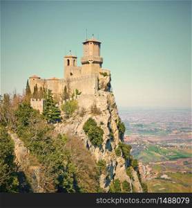 The first tower of San Marino on mount Titano, San Marino. Vintage style sepia toned image