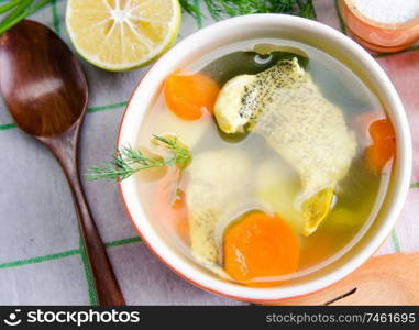 The fish soup served on the table in plate. Fish soup served on the table in plate