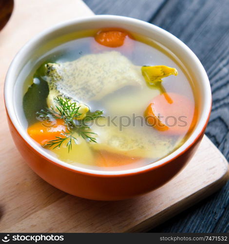 The fish soup served on the table in plate. Fish soup served on the table in plate