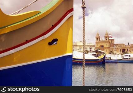 The Fishing Village of Marsaxlokk on the eastcoast of Malta in Europe.. EUROPE MALTA MARSAXLOKK