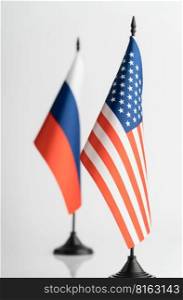 The flags of the USA and Russia on a white background isolated. The concept of policy. Flags of world leaders