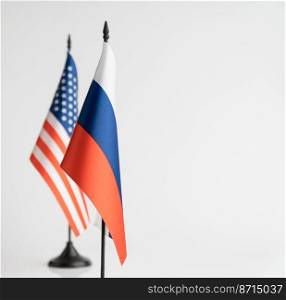 The flags of the USA and Russia on a white background isolated. The concept of policy. Flags of world leaders