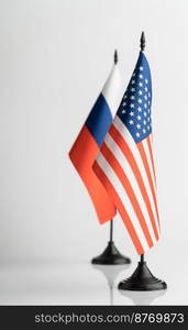 The flags of the USA and Russia on a white background isolated. The concept of policy. Flags of world leaders