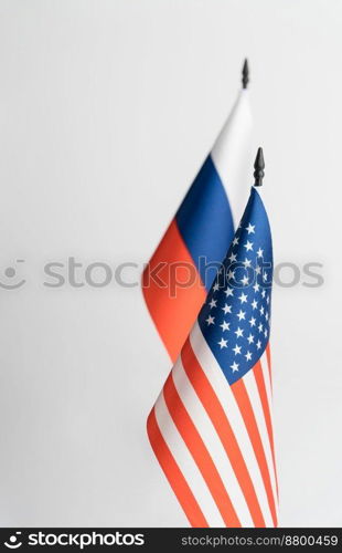 The flags of the USA and Russia on a white background isolated. The concept of policy. Flags of world leaders