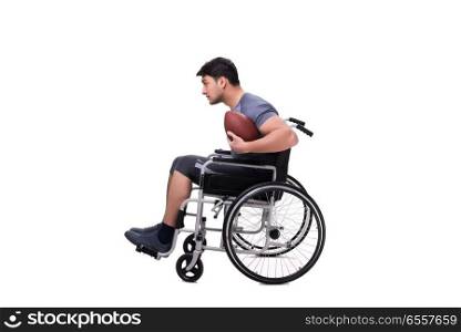The football player recovering from injury on wheelchair. Football player recovering from injury on wheelchair