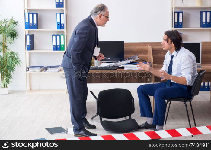 The forensic investigator investigating theft in the office. Forensic investigator investigating theft in the office