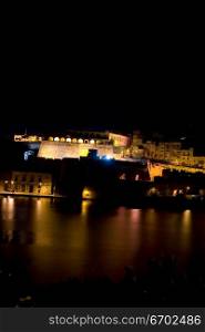 The forts of Valetta at night in Malta.
