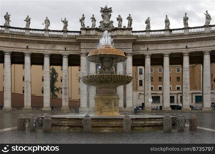 The fountain and colannade in Saint Peter&rsquo;s Square, Vatican City