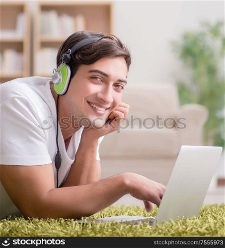 The freelancer working at home and listening to music. Freelancer working at home and listening to music